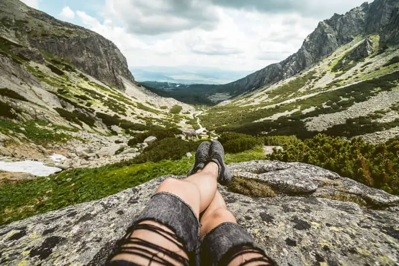 Man looking at the mountains