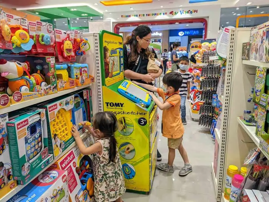 Kids playing in a toy store.