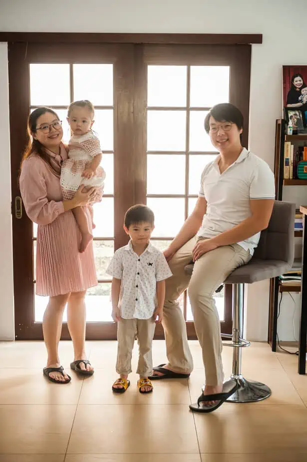 Family of four posing for a picture.