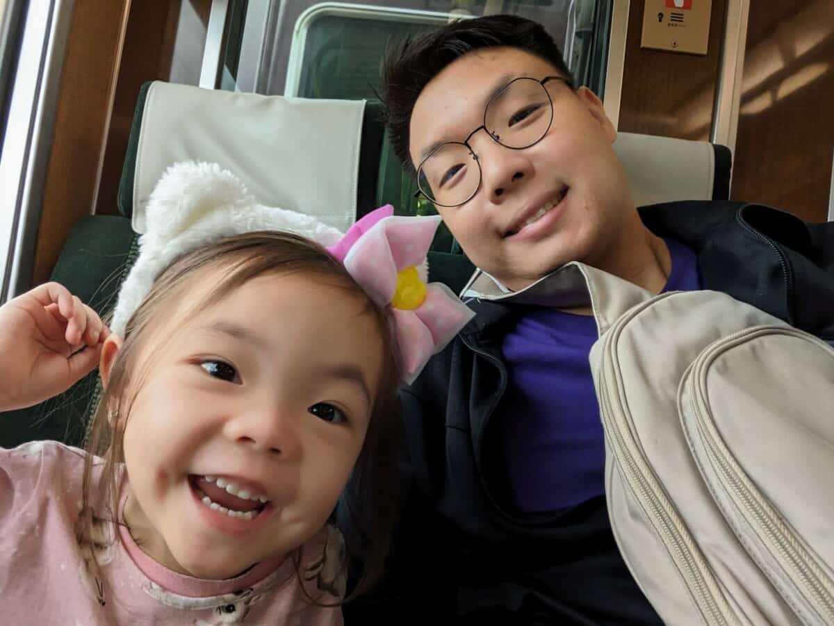 Dad and daughter riding a train in Japan | Can an enlarged yolk sac correct itself?
